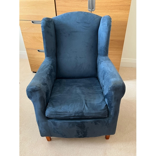 173 - A small blue wing back chair