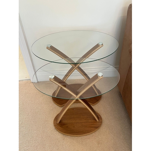 174 - A pair of nesting tables with oval glass and cross frame (H57cm W60cm D44cm)