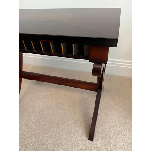 176 - A reproduction side table on cross support legs (58cm x 42cm)