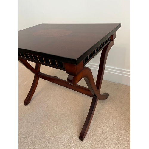 176 - A reproduction side table on cross support legs (58cm x 42cm)