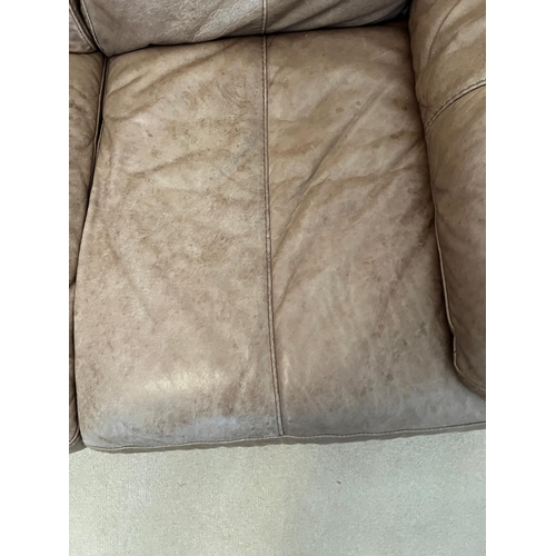 179 - A two seater leather sofa (H78cm W154cm D94cm)