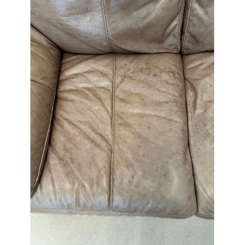 179 - A two seater leather sofa (H78cm W154cm D94cm)