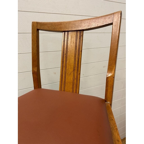 191 - A Mid Century Formica topped table and four chairs (H74cm W100cm D71cm)