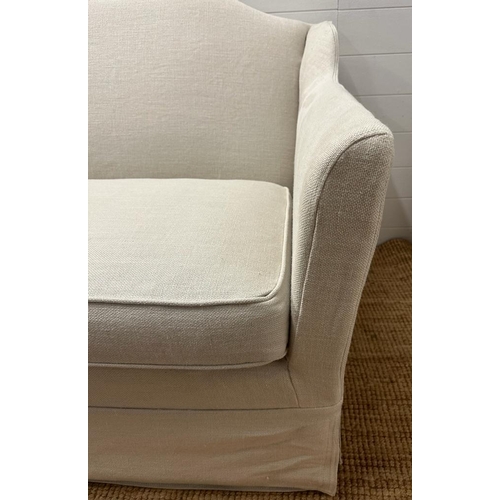 216 - A white linen upholstered two seat sofa by Neptune (W173cm)