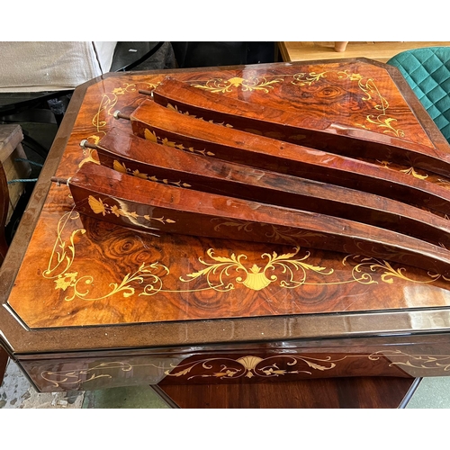 218 - An Italian inlaid games table with roulette, chest and including games pieces