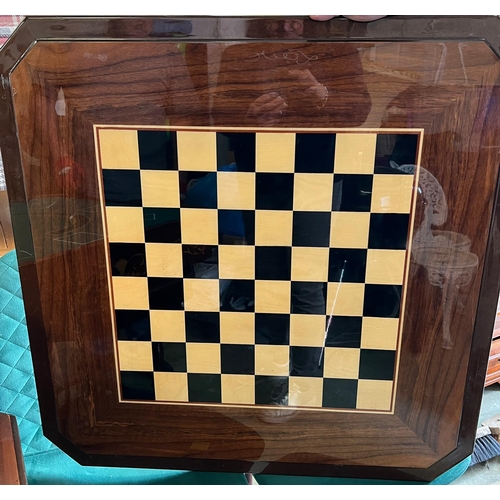 218 - An Italian inlaid games table with roulette, chest and including games pieces