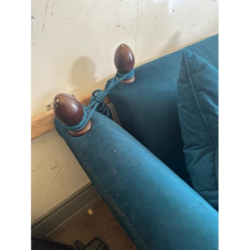 22 - A peacock blue upholstered drop end sofa (W216cm D100cm H78cm)