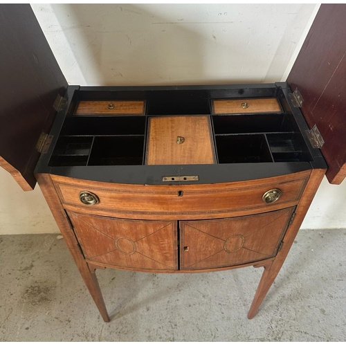 242 - An Edwardian style yew string inlaid work box on raised legs with compartments to top and cupboard u... 