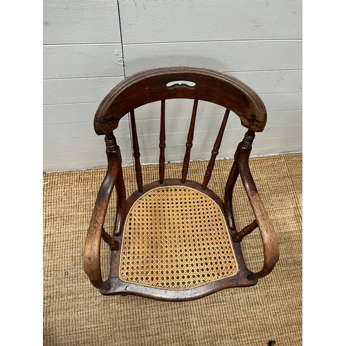 246 - A Victorian oak his and hers stick back chairs with cane seat s