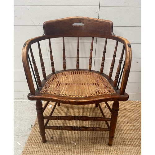 246 - A Victorian oak his and hers stick back chairs with cane seat s