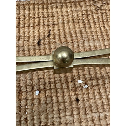 250 - A mid-century brass smoked glass topped coffee table. Height 42 and 45x90