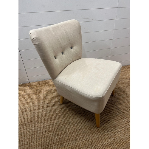 252 - A low button back chair