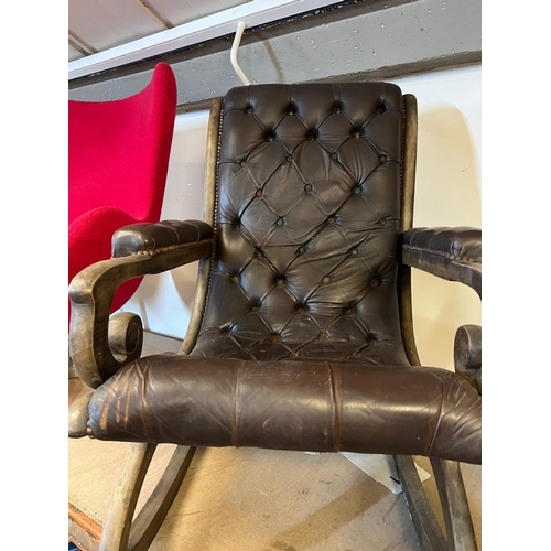 265 - A Chesterfield brown rocking chair