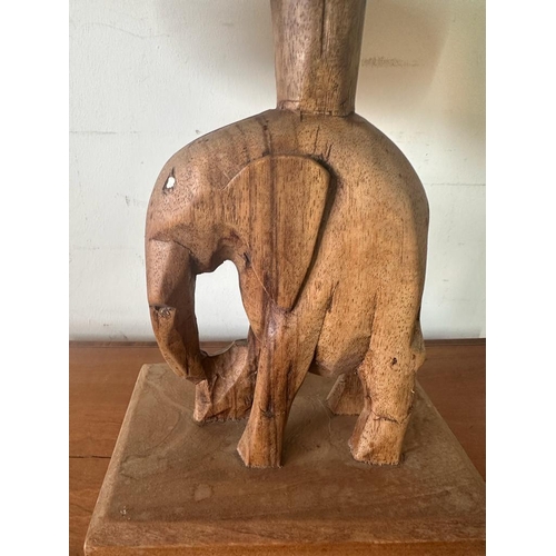 266 - A small tribal art side table with central carved elephant (H34cm W40cm D26cm)