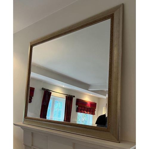 286 - A contemporary wall mirror (110cm x 131cm)