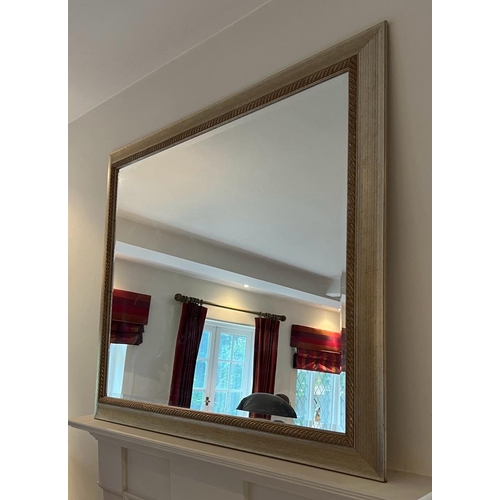 286 - A contemporary wall mirror (110cm x 131cm)