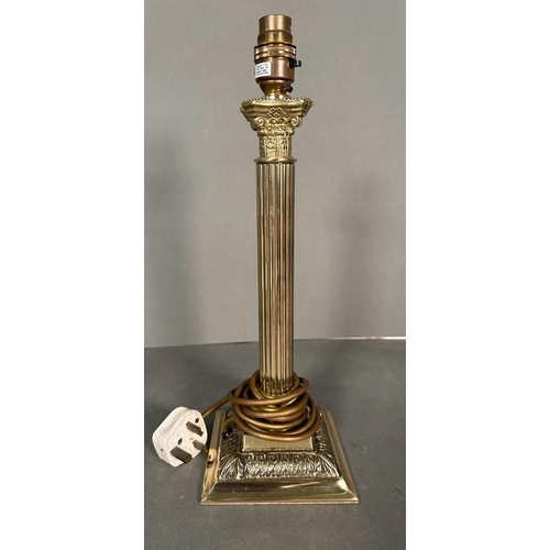 301 - A pair of brass empire column table lamps