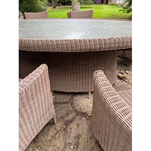 346 - An Ocean garden rattan dining table and eight chairs