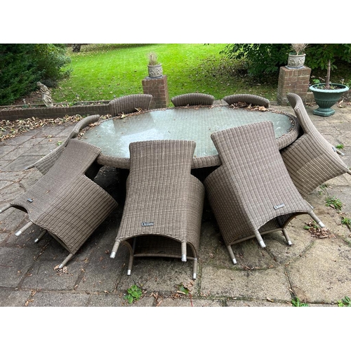 346 - An Ocean garden rattan dining table and eight chairs