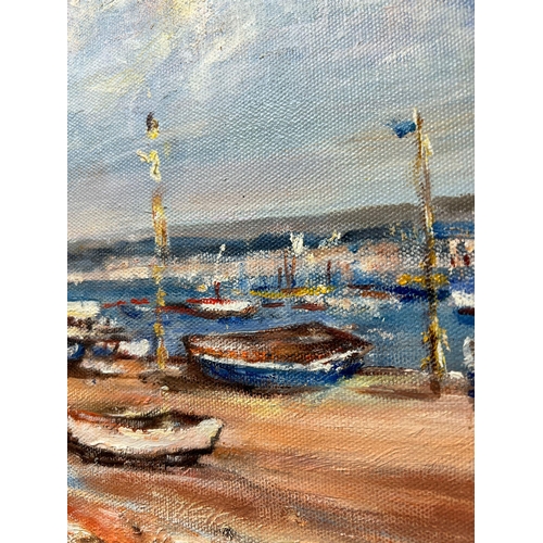 369 - A contemporary oil on canvas of a coastal scene (52cm x 62cm)