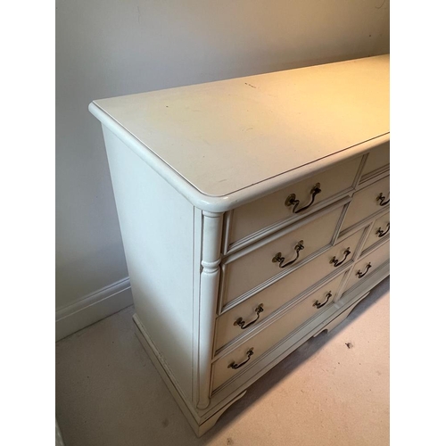 40 - A Laura Ashley long chest of drawers on bracket feet (H93cm W143cm D48cm)