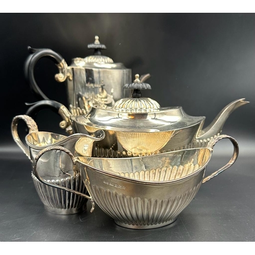 435 - A Four Piece silver tea service to include teapot, hot water jug, sugar bowl and milk jug by A Marst... 