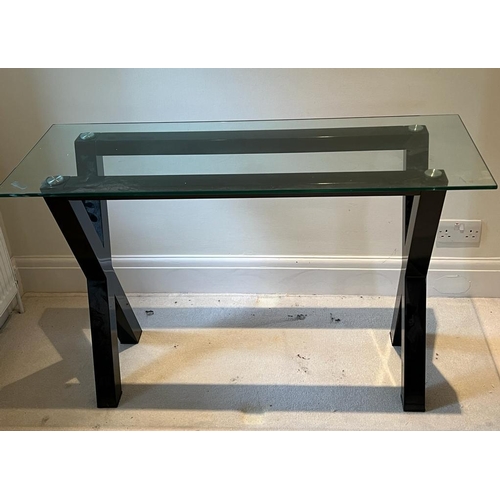 44 - A cross frame console table with glass top