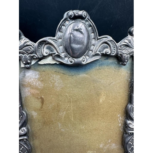 443 - A hallmarked easel backed silver picture frame.