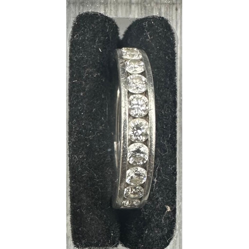 464 - A platinum ring set with ten diamonds