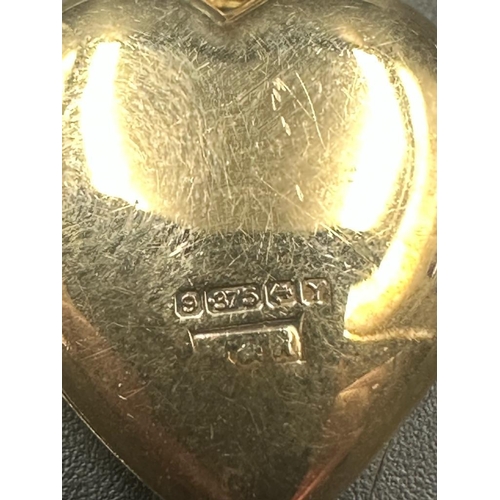 476 - A 9ct gold locket on chain, locket total weight 2.3g