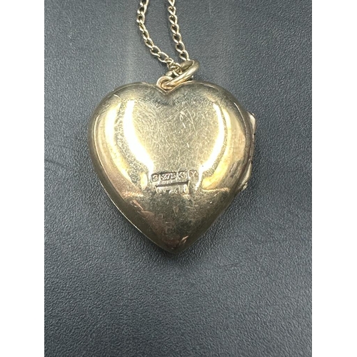 476 - A 9ct gold locket on chain, locket total weight 2.3g