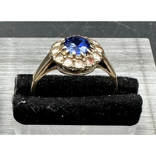 478 - A 9ct gold ring with central blue stone and seed pearls AF (Approximate total weight 2.5g)