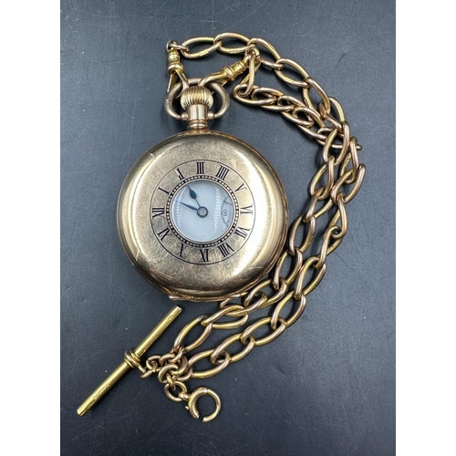 479 - A gold plated half hunter pocket watch on a 9ct gold Albert chain (Approximate weight of chain 38.5g... 