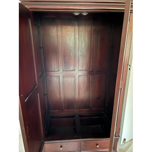 48 - A two door hanging wardrobe or two shelf linen cupboard (H186cm W108cm D57cm)