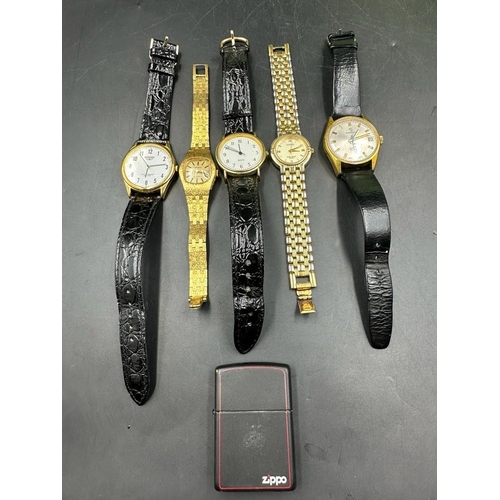 483 - A selection of watches various makers and a Zippo lighter