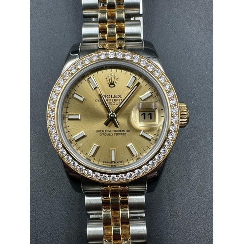 484 - A Ladies Rolex Oyster Perpetual Datejust with diamond bezel, two tone gold and silver wristwatch box... 