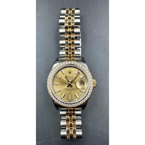 484 - A Ladies Rolex Oyster Perpetual Datejust with diamond bezel, two tone gold and silver wristwatch box... 