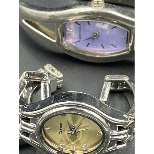 485 - A selection of four vintage watches to include Seiko and Sekonda.