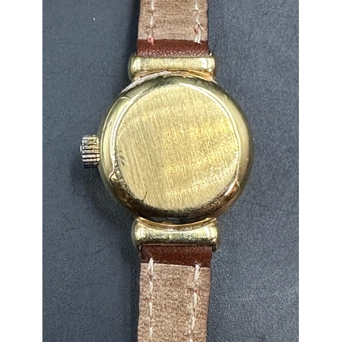 493A - A Ladies 18ct gold Omega De Ville wristwatch, circular gold coloured dial, yellow faceted dot hourly... 