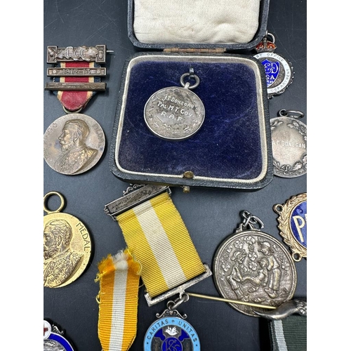 497 - A selection of various medals and medallions.