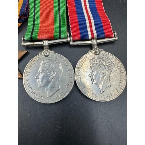 499 - Militaria: A WWII Medal Bar to include War Medal, Defence Medal, The Burma Star and 1939-45 Star.