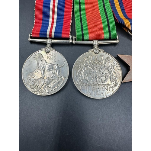 499 - Militaria: A WWII Medal Bar to include War Medal, Defence Medal, The Burma Star and 1939-45 Star.