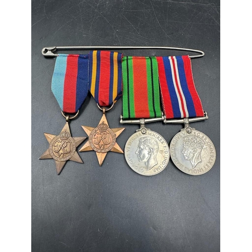 499 - Militaria: A WWII Medal Bar to include War Medal, Defence Medal, The Burma Star and 1939-45 Star.