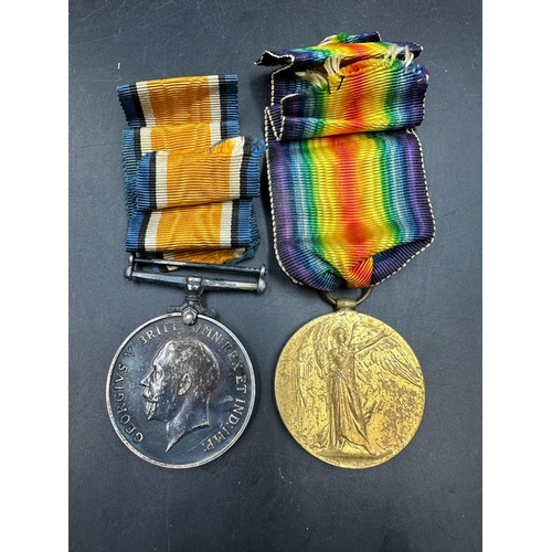 500 - A pair of WWI medals for 10883 PTE J GRANT A.CYC.CORPS Great war Medal and 1914-18 medal.