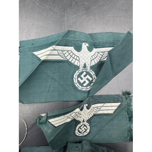 502 - Three WWII German Army EM/NCO's breast eagles.