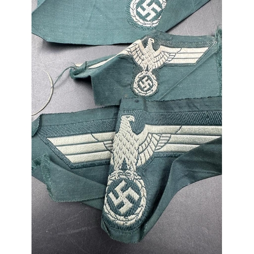 502 - Three WWII German Army EM/NCO's breast eagles.