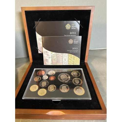 512 - The Royal Mint 2011 United Kingdom Executive Proof Set and the Queen's New portrait Specimen set.