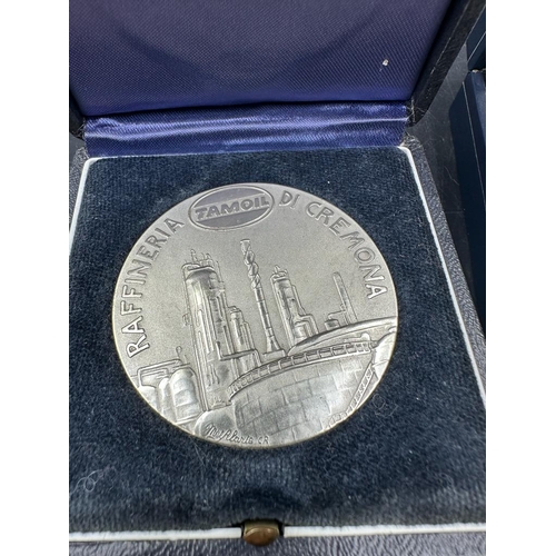 517 - A selection of three boxed commemorative coins to include Citi bank Bahrain and Tamoil