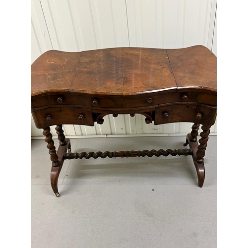 53 - A mahogany ladies writing desk on spiral supports