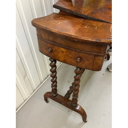 53 - A mahogany ladies writing desk on spiral supports